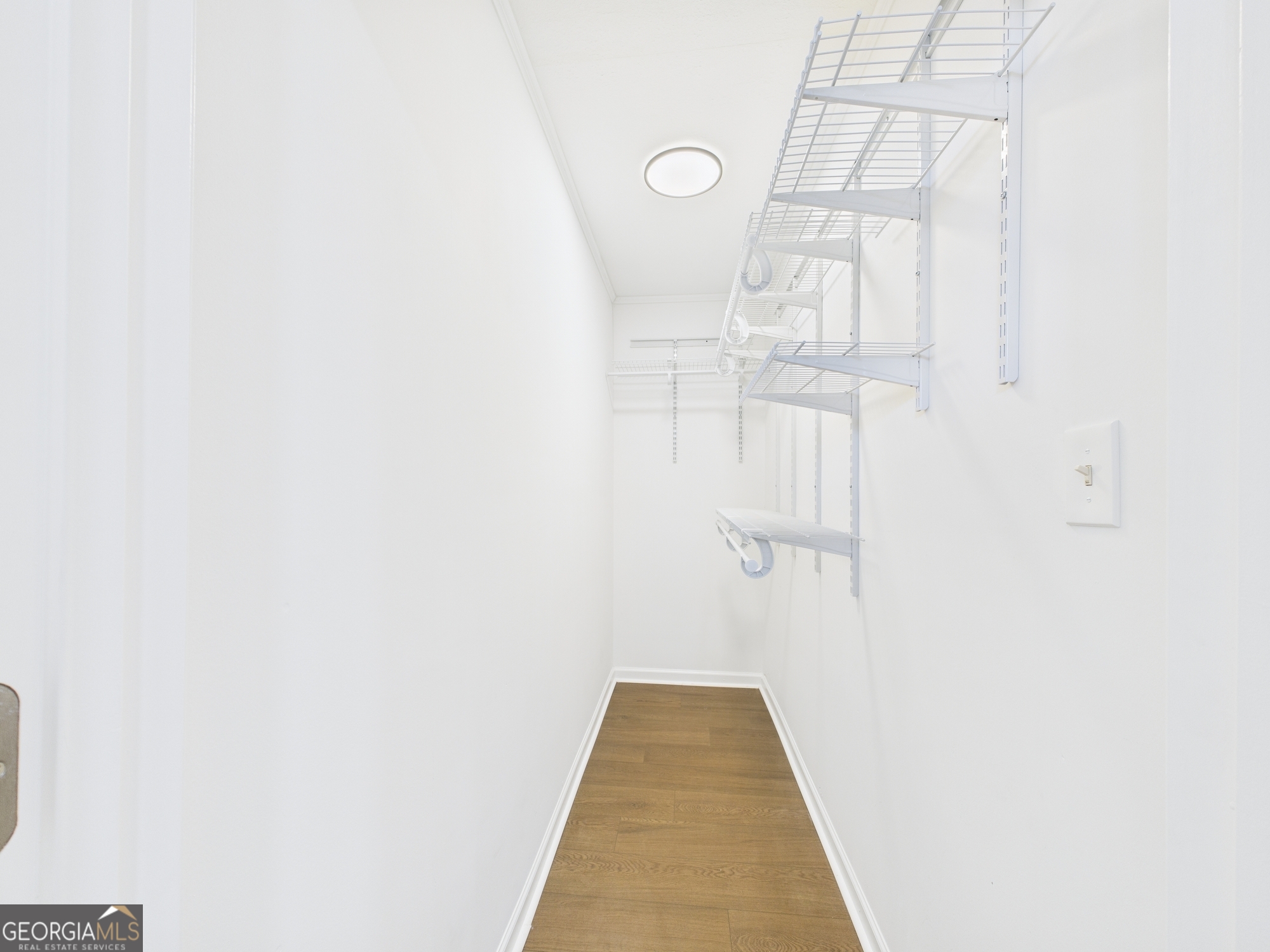 2489 Locksley Drive Macon, GA 31206 - Photo 28 of 42 a view of a hallway with white walls