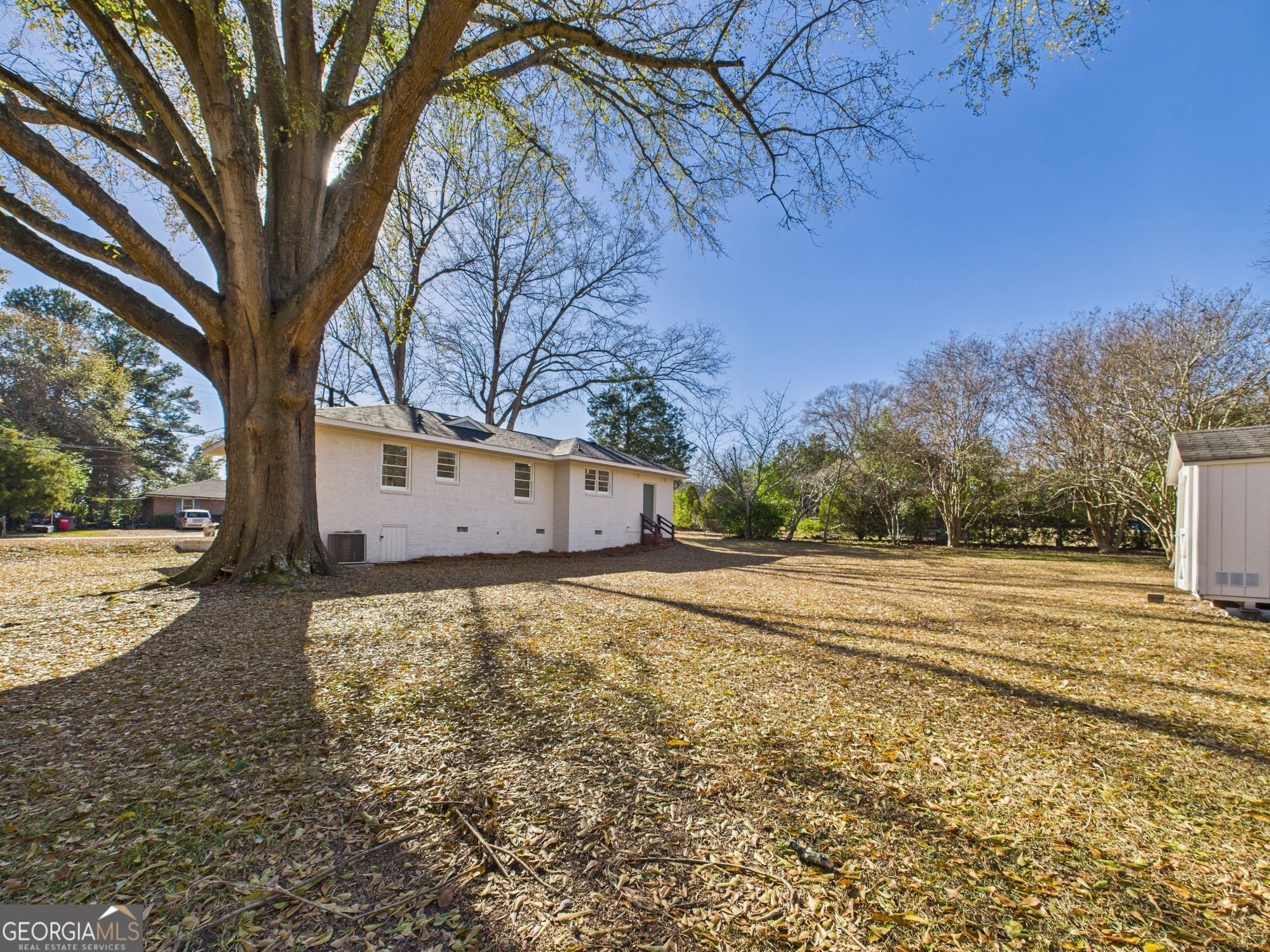 2489 Locksley Drive Macon, GA 31206 - Photo 37 of 42 a view of a yard with a large tree