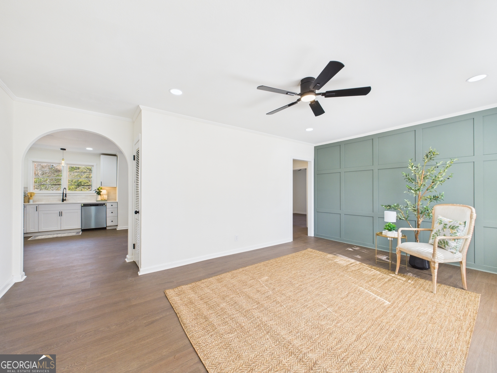 2489 Locksley Drive Macon, GA 31206 - Photo 4 of 42 a living room with furniture and a chandelier