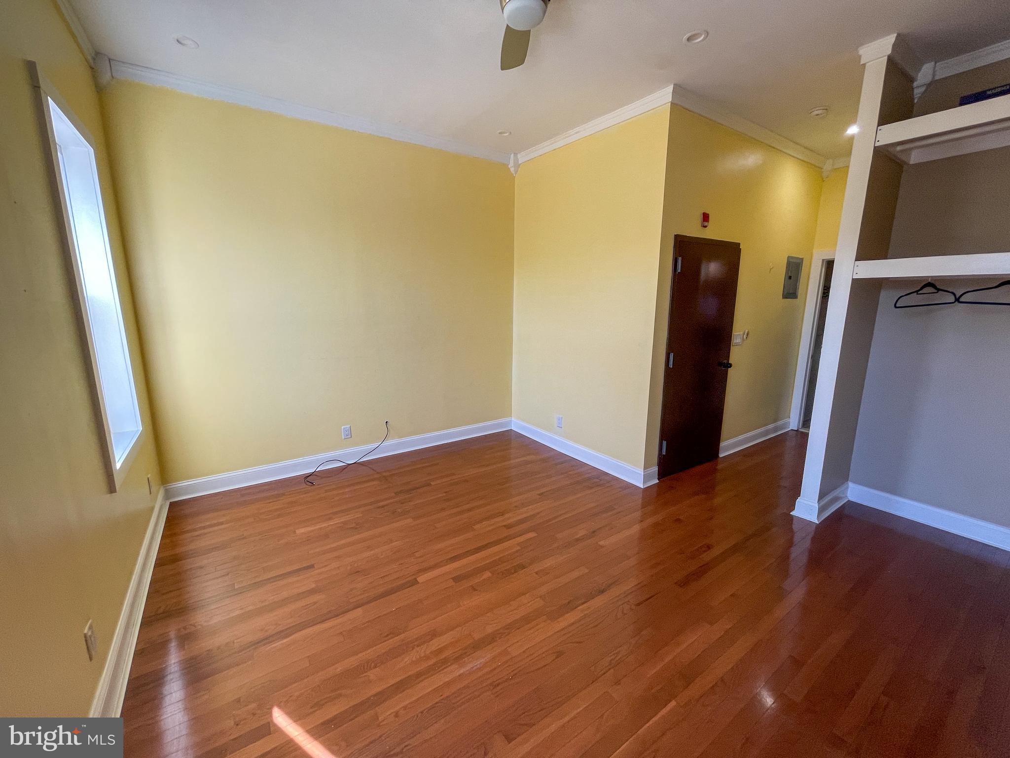 122 North 53rd Street Philadelphia, PA 19139 - Photo 8 of 11 a view of empty room with wooden floor