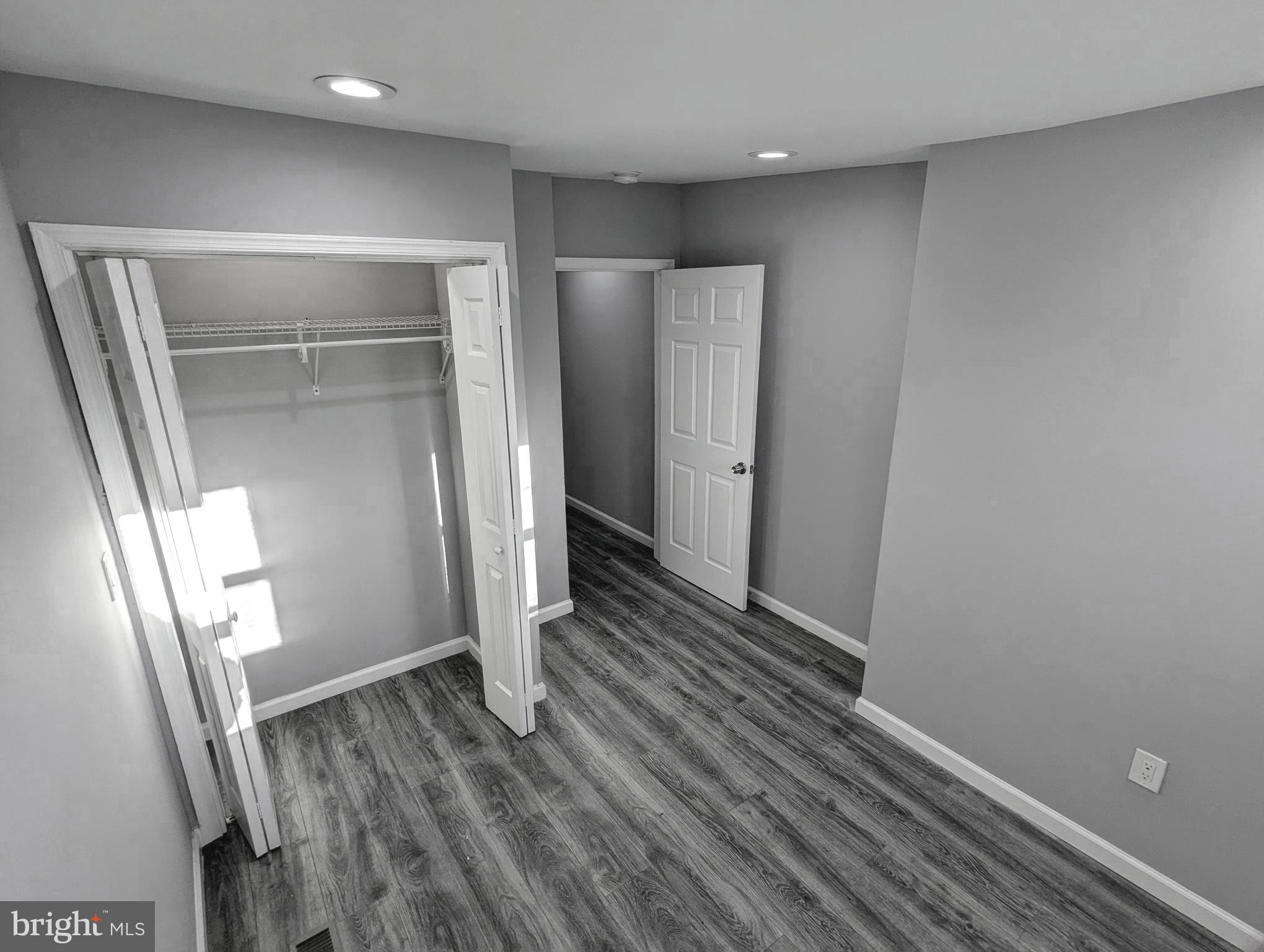 626 North Payson Street Baltimore, MD 21217 - Photo 14 of 23 a view of hallway with wooden floor