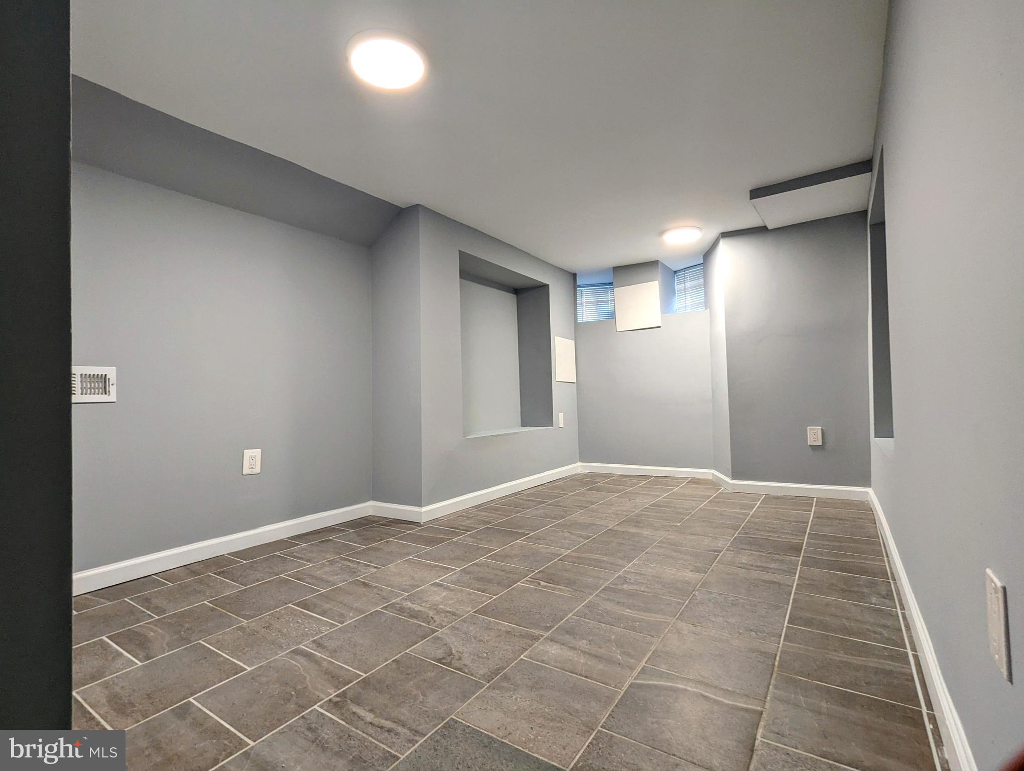 626 North Payson Street Baltimore, MD 21217 - Photo 21 of 23 a view of an empty room and window