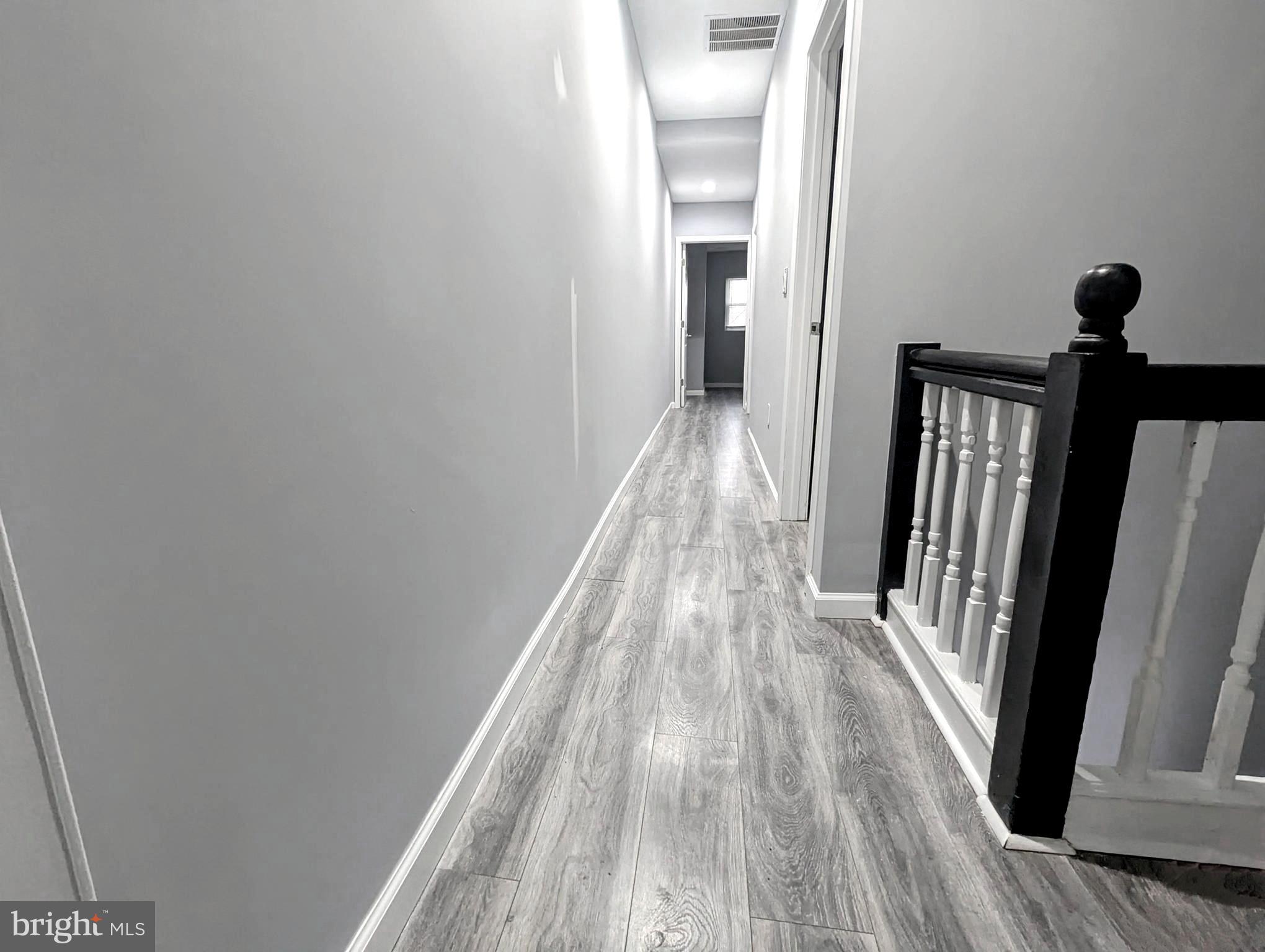 626 North Payson Street Baltimore, MD 21217 - Photo 9 of 23 wooden floor in a gallery