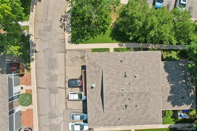 aerial view of a house with a yard