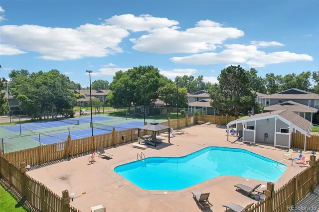 an aerial view of a house with outdoor space