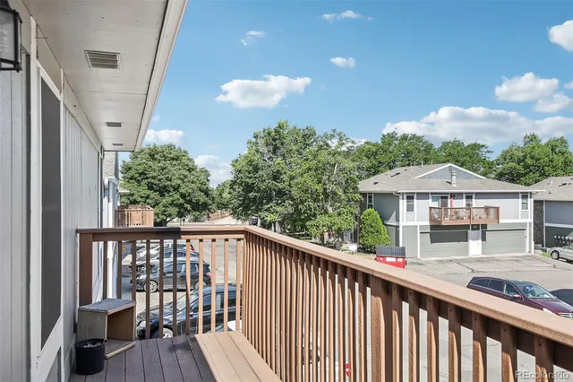 a view of a street from a balcony