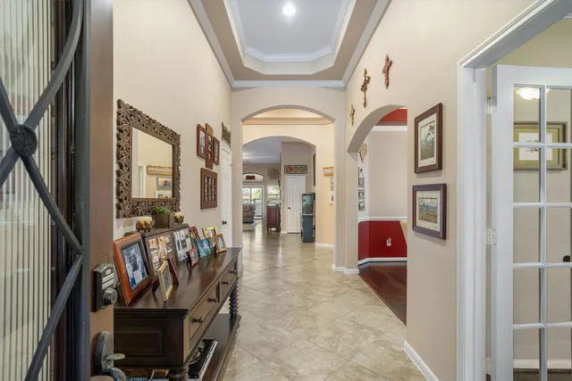 a view of living room with furniture and wooden floor