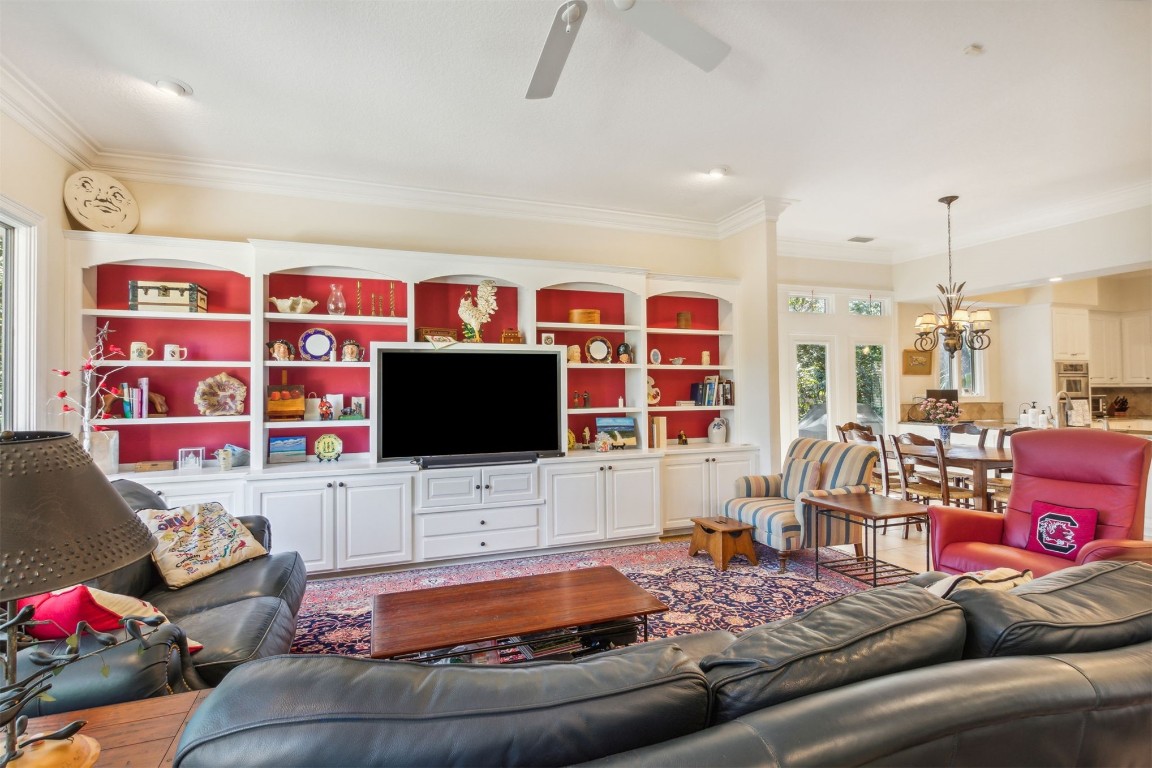 10 Marsh Creek Road Amelia Island, FL 32034 - Photo 11 of 73 a living room with furniture and a flat screen tv