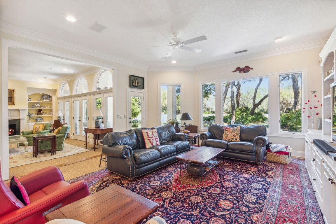 10 Marsh Creek Road Amelia Island, FL 32034 - Photo 12 of 73 a living room with furniture wooden floor and a large window
