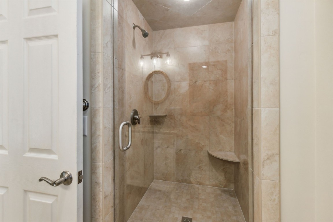 10 Marsh Creek Road Amelia Island, FL 32034 - Photo 19 of 73 a bathroom with a glass shower door