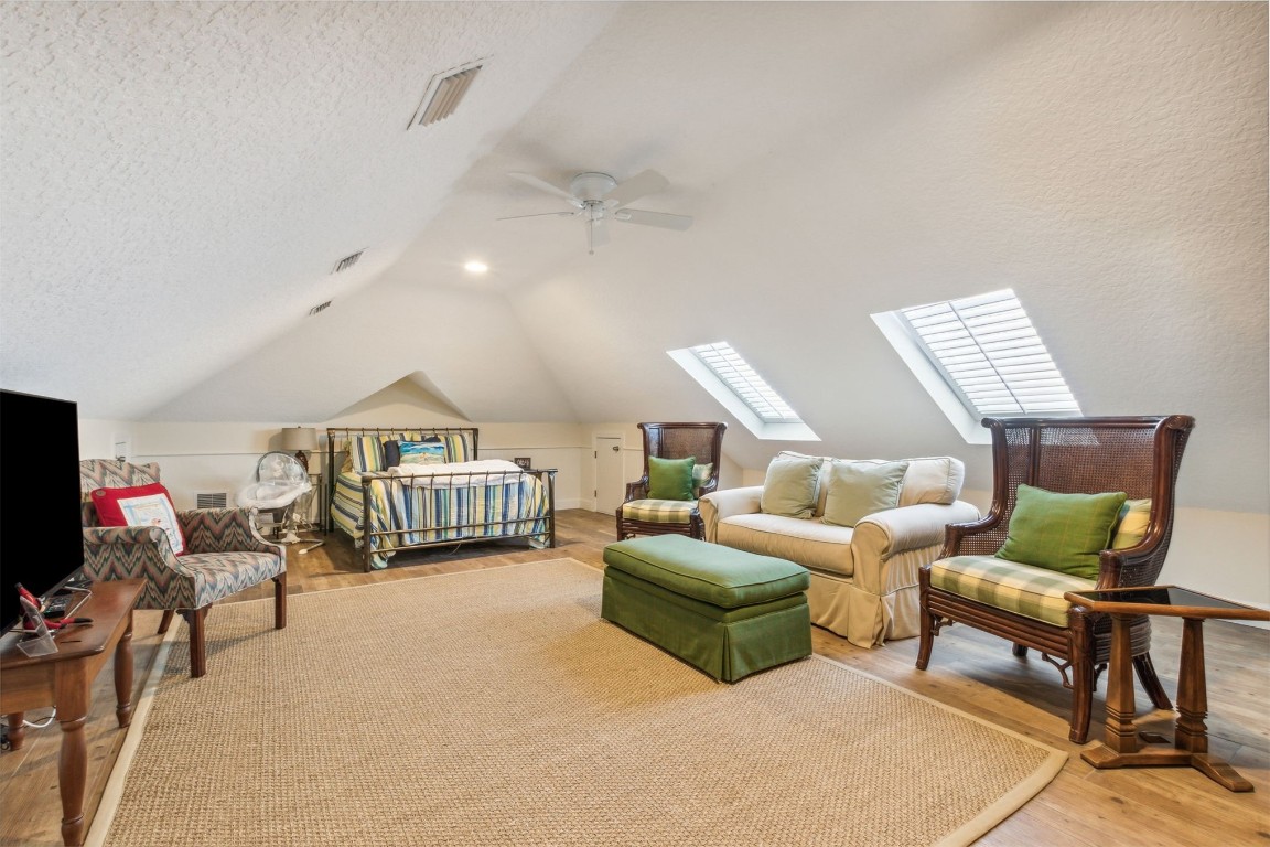 10 Marsh Creek Road Amelia Island, FL 32034 - Photo 21 of 73 a living room with furniture and a flat screen tv