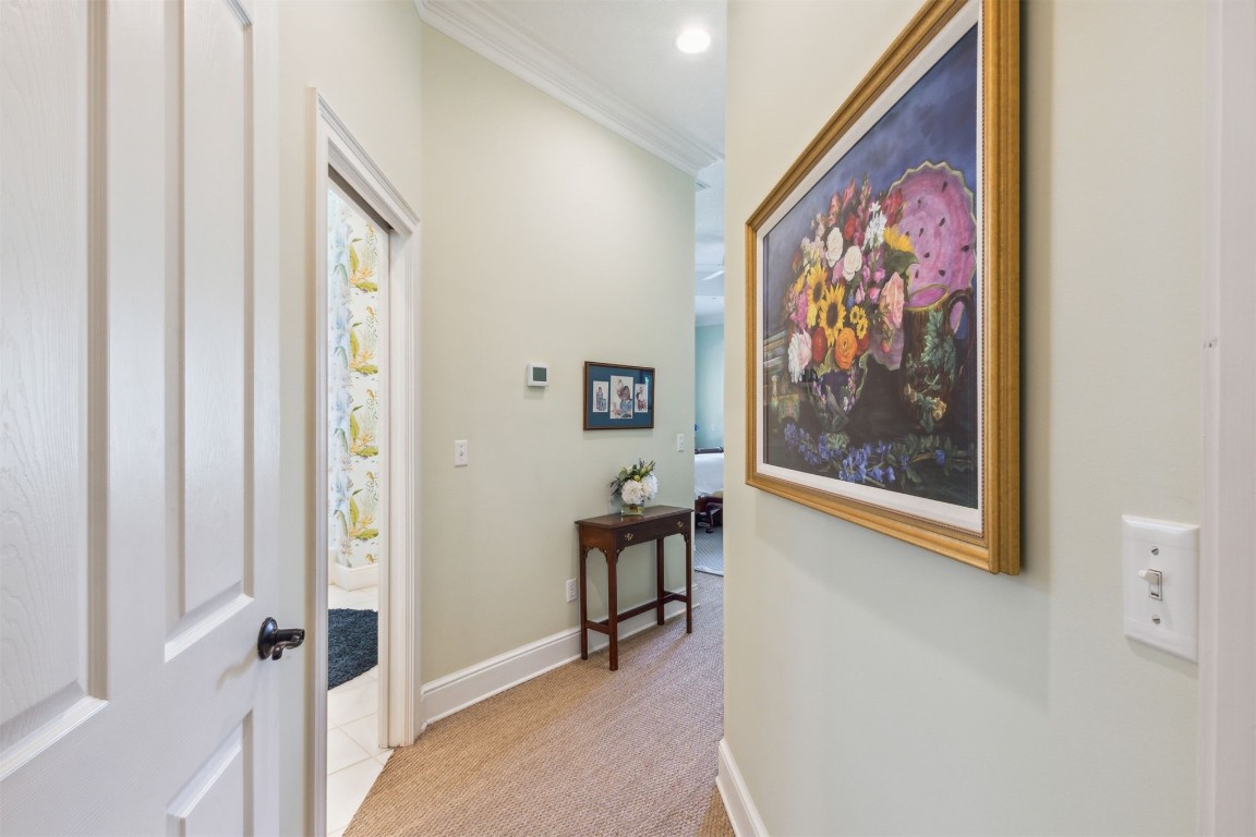 10 Marsh Creek Road Amelia Island, FL 32034 - Photo 24 of 73 a view of a hallway with couches and painted walls