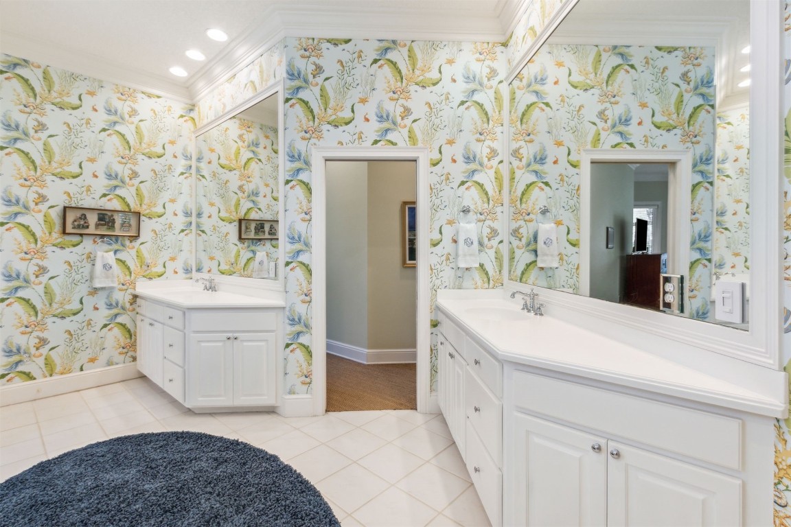 10 Marsh Creek Road Amelia Island, FL 32034 - Photo 27 of 73 a spacious bathroom with a sink a vanity and a mirror