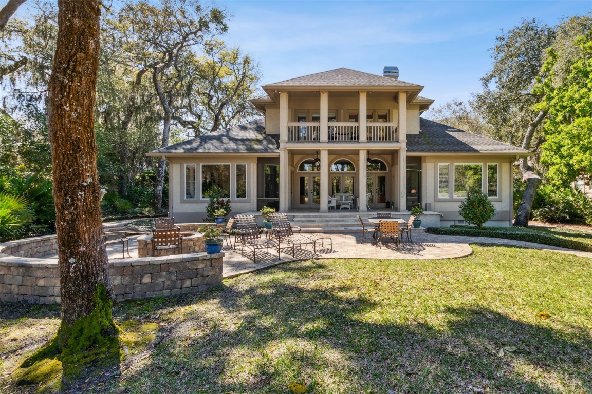 10 Marsh Creek Road Amelia Island, FL 32034 - Photo 36 of 73 a front view of a house with swimming pool and porch