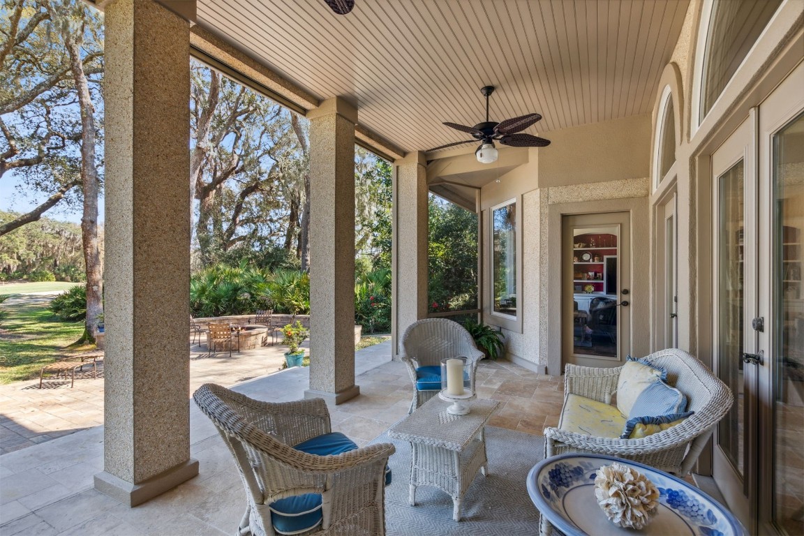 10 Marsh Creek Road Amelia Island, FL 32034 - Photo 42 of 73 a living room with furniture and a large window