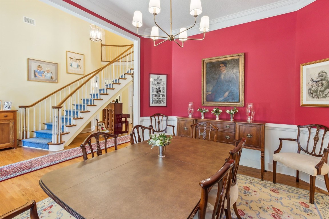 10 Marsh Creek Road Amelia Island, FL 32034 - Photo 6 of 73 a dining room with furniture and a chandelier