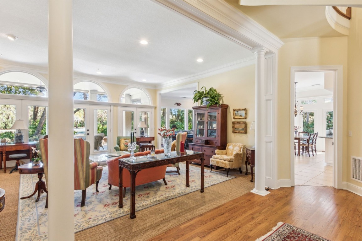 10 Marsh Creek Road Amelia Island, FL 32034 - Photo 8 of 73 a living room with furniture and a wooden floor