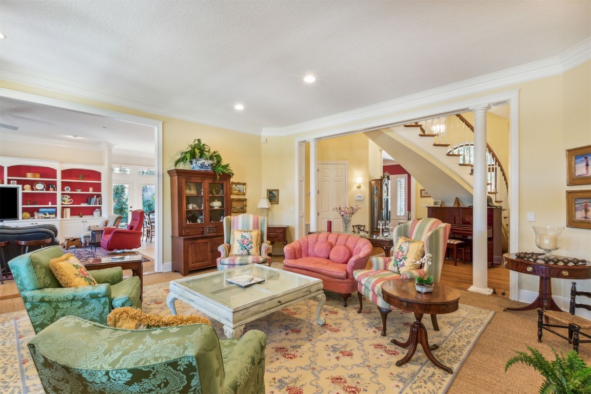 10 Marsh Creek Road Amelia Island, FL 32034 - Photo 9 of 73 a living room with furniture and a floor to ceiling window