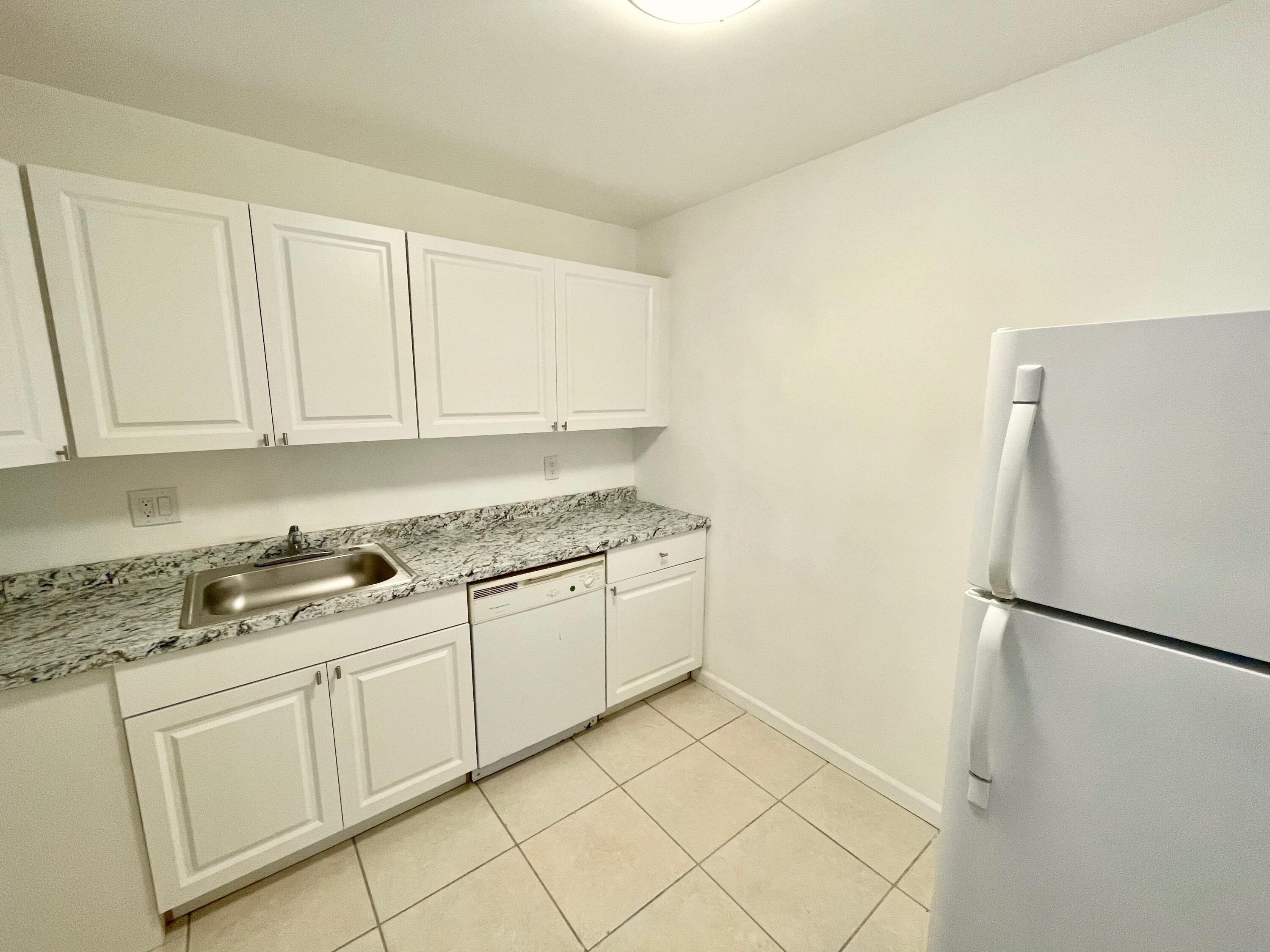 634 Northwest 13th Street, Unit 35 Boca Raton, FL 33486 - Photo 1 of 11 Oaks of Boca 634 #35 - 12