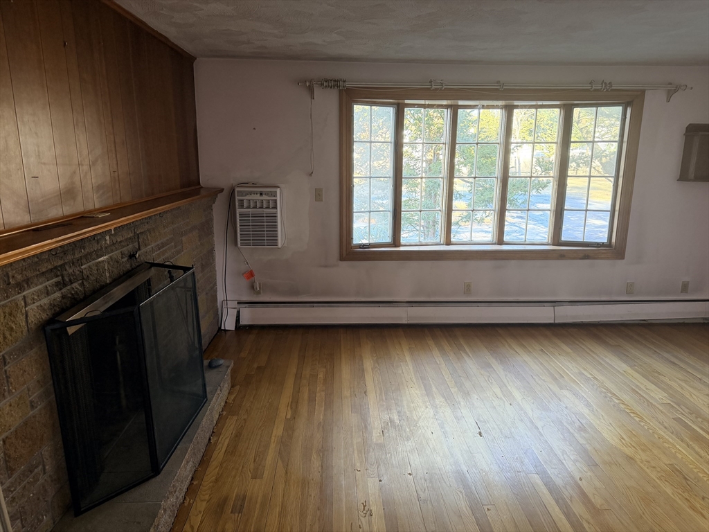 1 Nevada Road Burlington, MA 01803 - Photo 11 of 21 a view of a hardwood floor in an empty room
