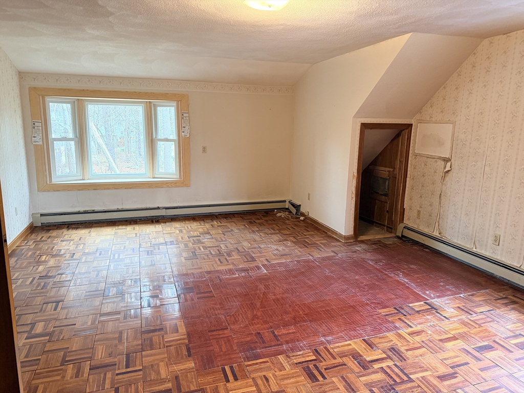 1 Nevada Road Burlington, MA 01803 - Photo 19 of 21 a view of an empty room with a window