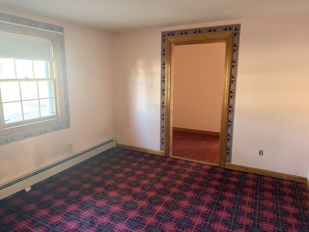 1 Nevada Road Burlington, MA 01803 - Photo 8 of 21 an empty room with a door