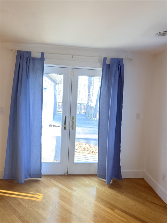 1 Nevada Road Burlington, MA 01803 - Photo 9 of 21 a view of an empty room and window
