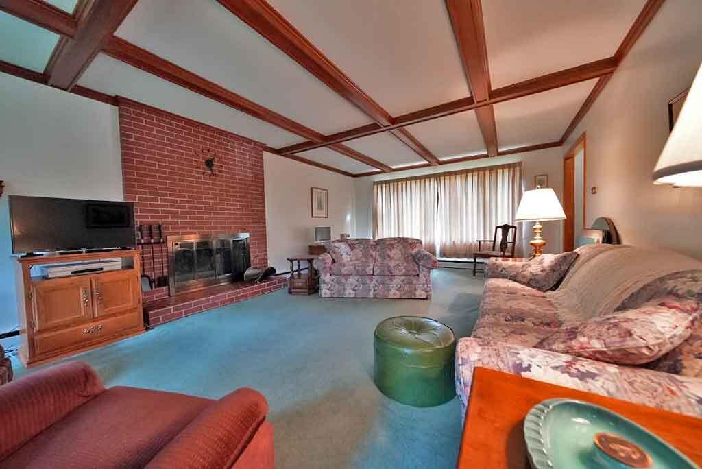 33 Maple Street Houlton, ME 04730 - Photo 18 of 80 living-room-beamed-ceiling