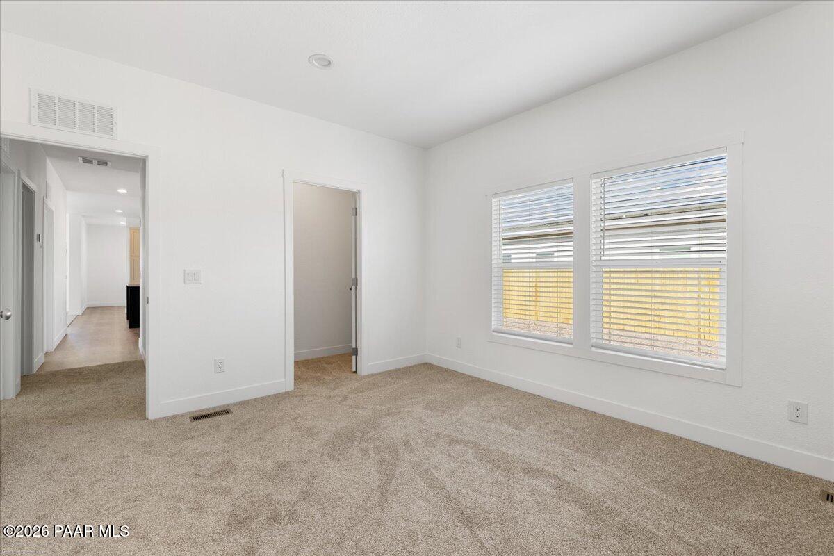 65 Hawaii Road Paulden, AZ 86334 - Photo 15 of 29 an empty room with windows