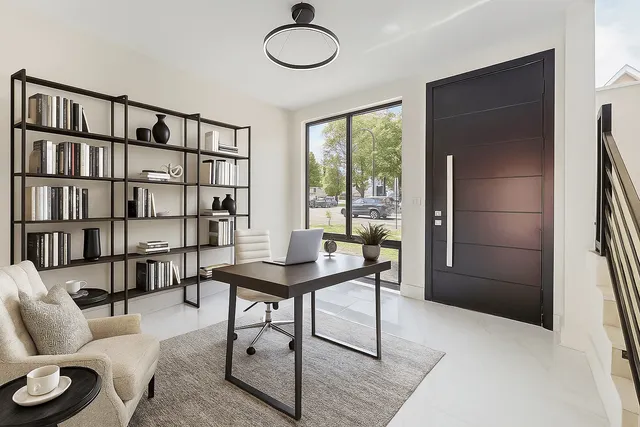 a livingroom with furniture and a book shelf