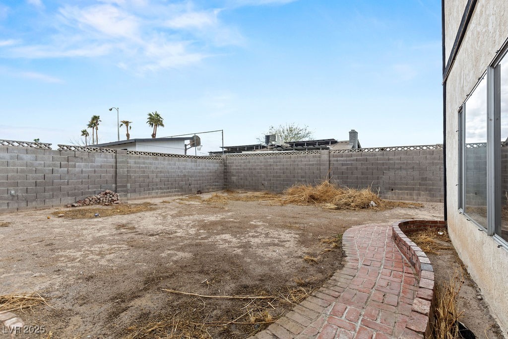 4155 Comb Circle Las Vegas, NV 89104 - Photo 46 of 46 View of yard featuring a fenced backyard