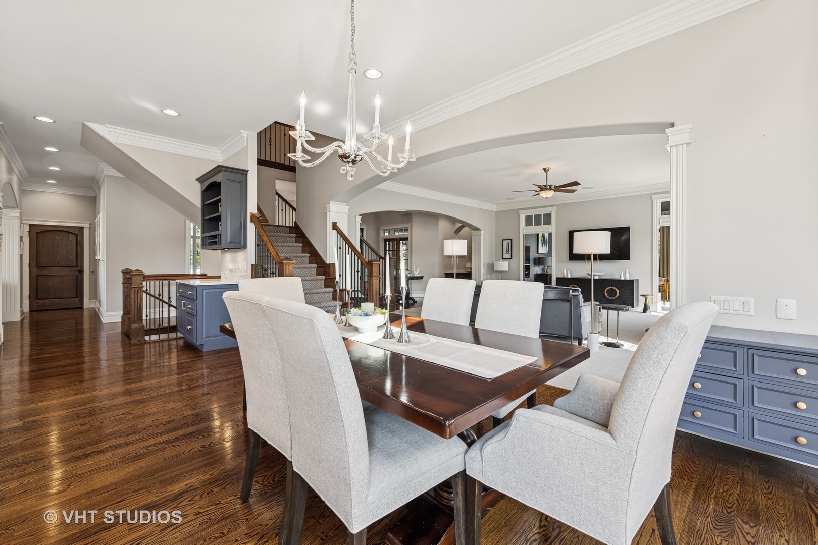 1227 Arnold Court Downers Grove, IL 60516 - Photo 22 of 72 a living room with couches chairs and kitchen view with wooden floor