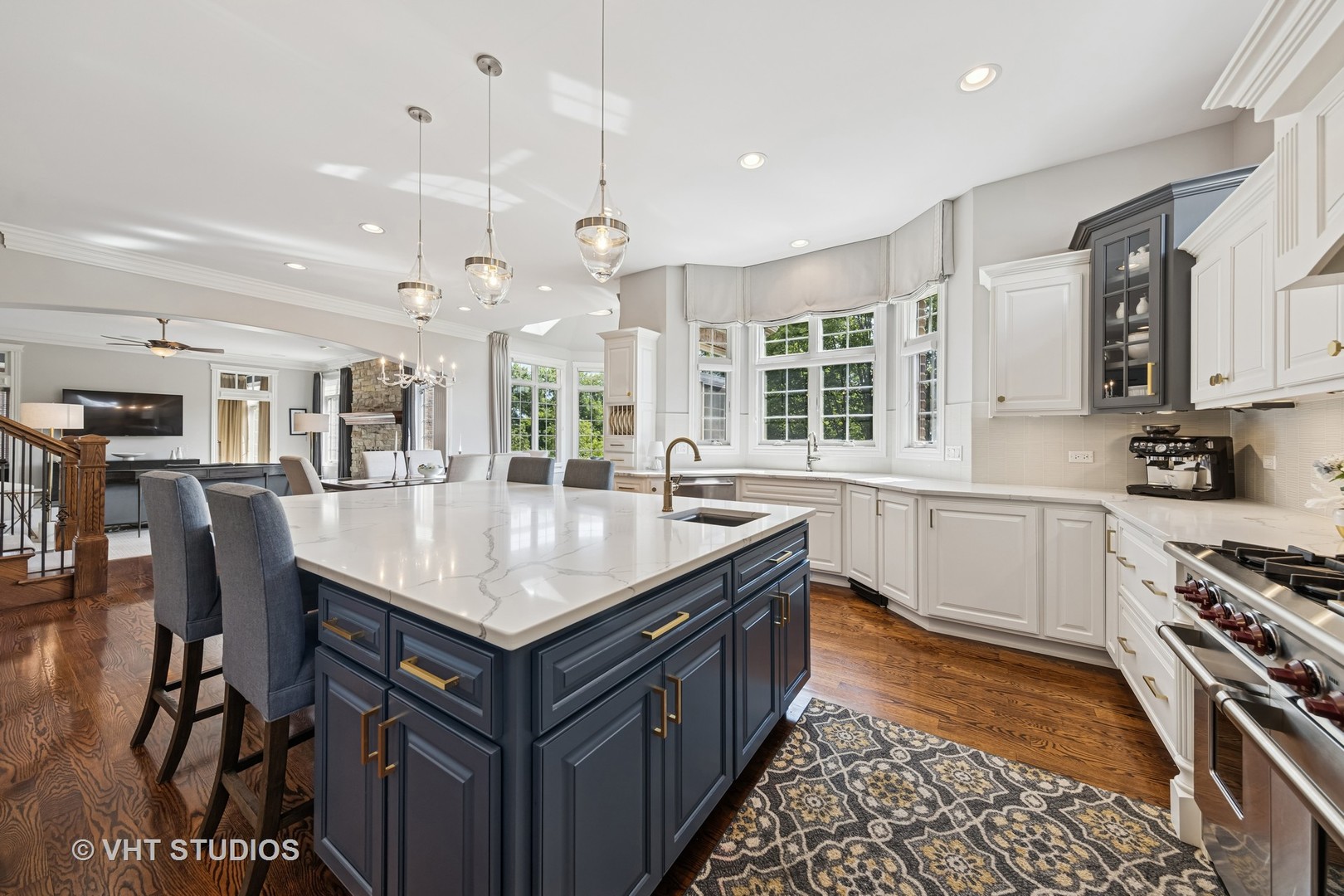 1227 Arnold Court Downers Grove, IL 60516 - Photo 27 of 72 a kitchen with stainless steel appliances granite countertop a stove a sink dishwasher a dining table and chairs with wooden floor