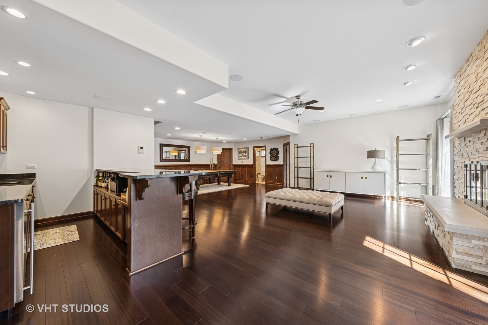 1227 Arnold Court Downers Grove, IL 60516 - Photo 40 of 72 a view of a living room and kitchen with furniture wooden floor and windows