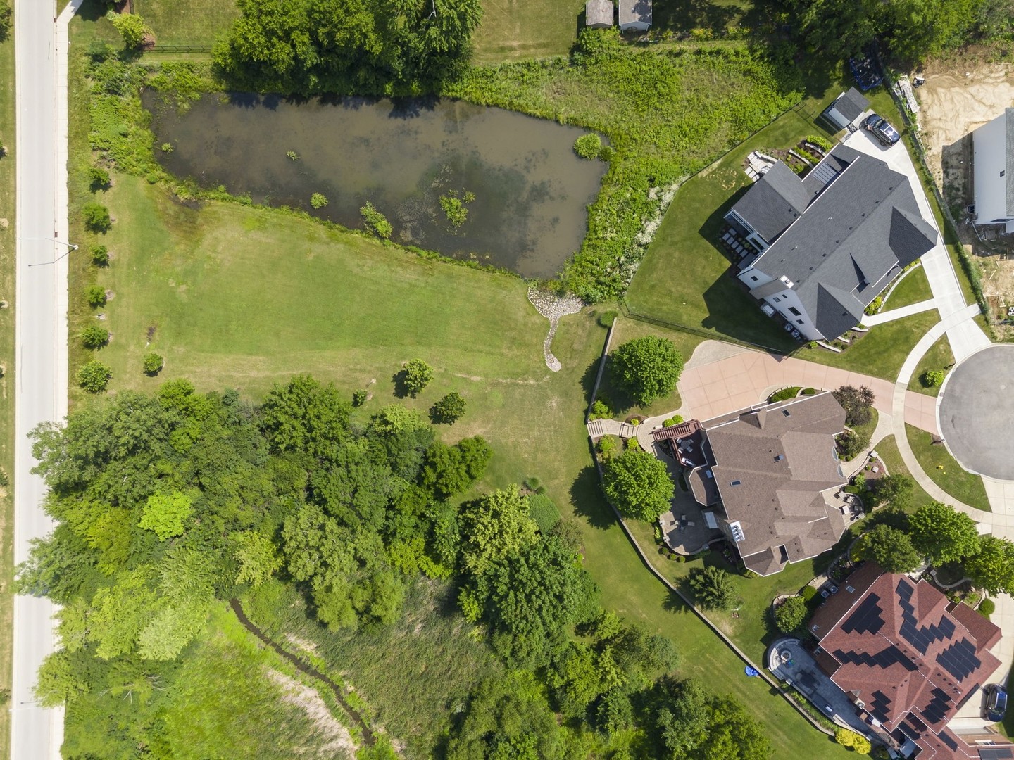 1227 Arnold Court Downers Grove, IL 60516 - Photo 62 of 72 an aerial view of residential houses with outdoor space and swimming pool
