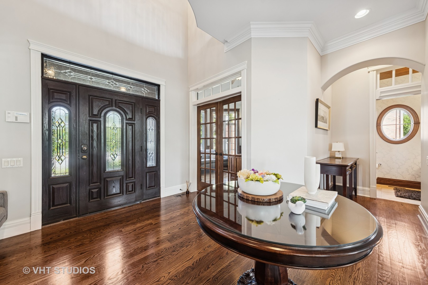 1227 Arnold Court Downers Grove, IL 60516 - Photo 8 of 72 a view of a dining room with furniture a chandelier and wooden floor