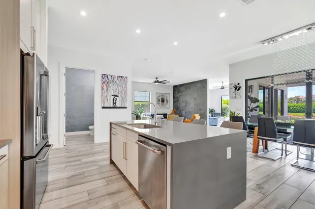 a kitchen with appliances and cabinets