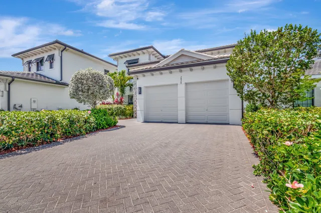 front view of a house with a street