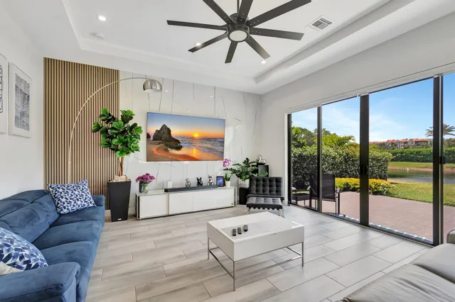 a kitchen with stainless steel appliances granite countertop a stove and cabinets