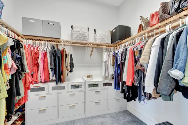 a view of a livingroom with wooden floor