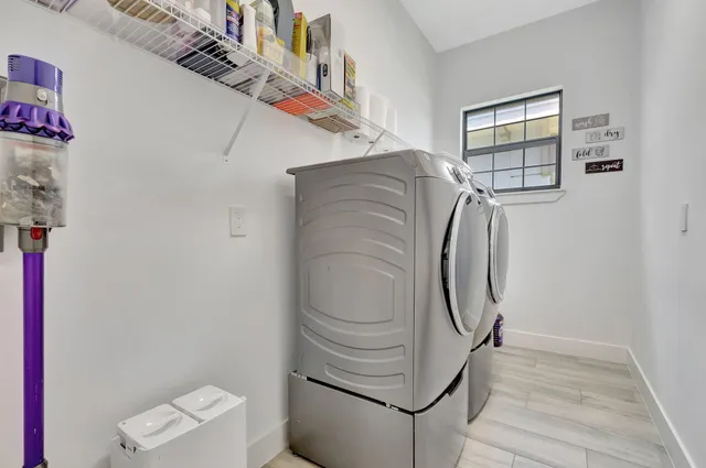 a kitchen with stainless steel appliances granite countertop a stove and cabinets