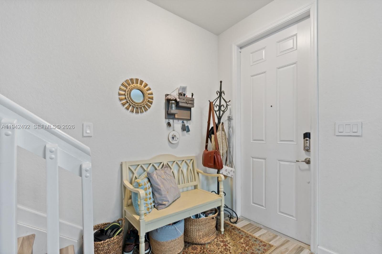 3304 West 92nd Place Hialeah, FL 33018 - Photo 23 of 34 a bedroom with a bed and a window