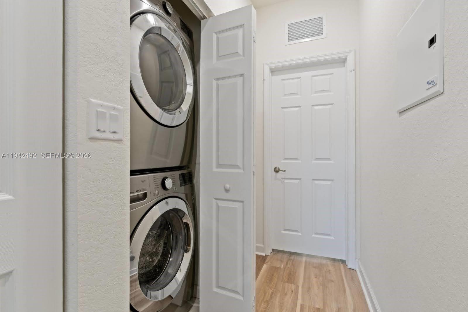 3304 West 92nd Place Hialeah, FL 33018 - Photo 24 of 34 a utility room with dryer and washer