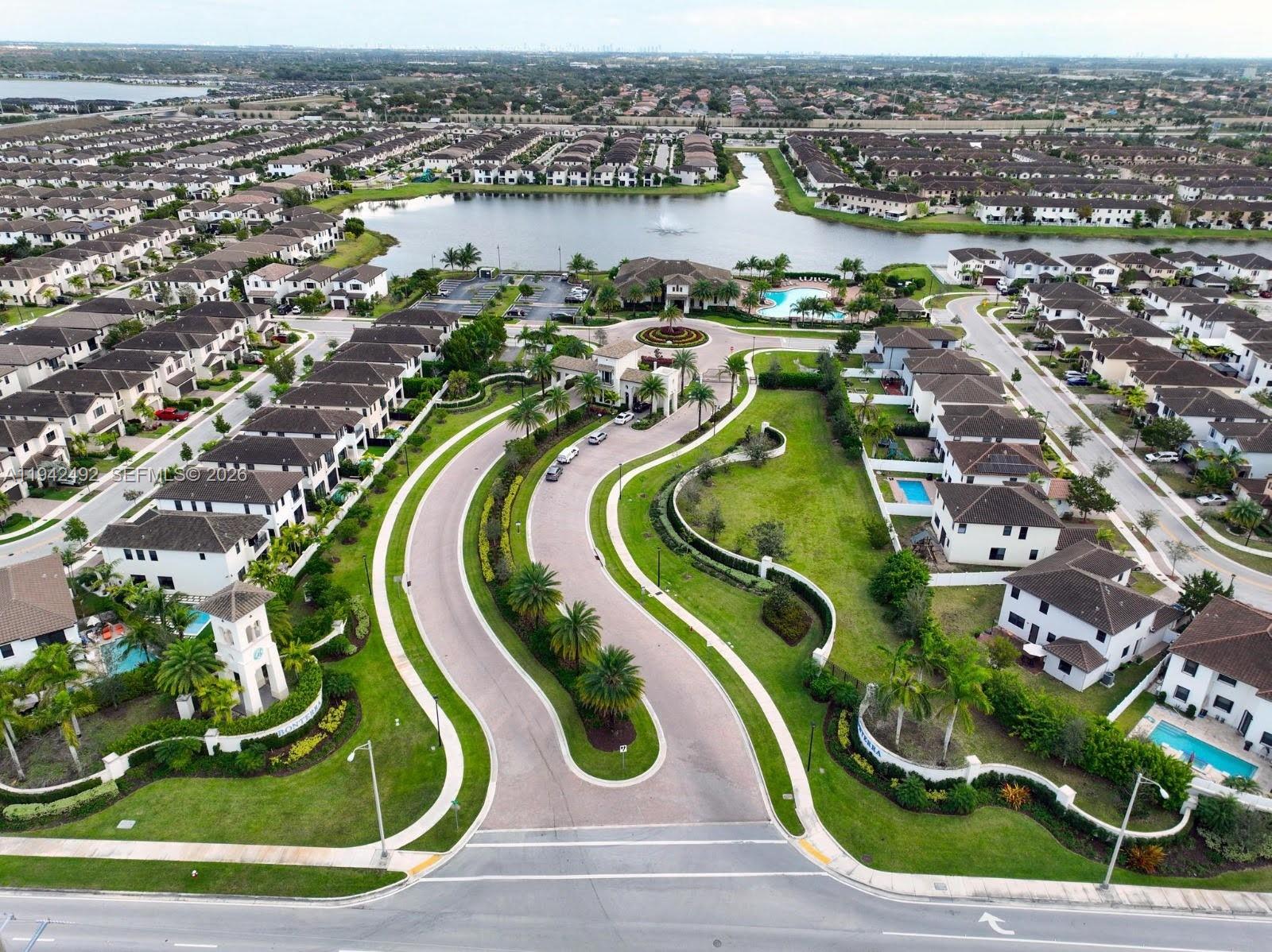 3304 West 92nd Place Hialeah, FL 33018 - Photo 26 of 34 an aerial view of a swimming pool and outdoor space
