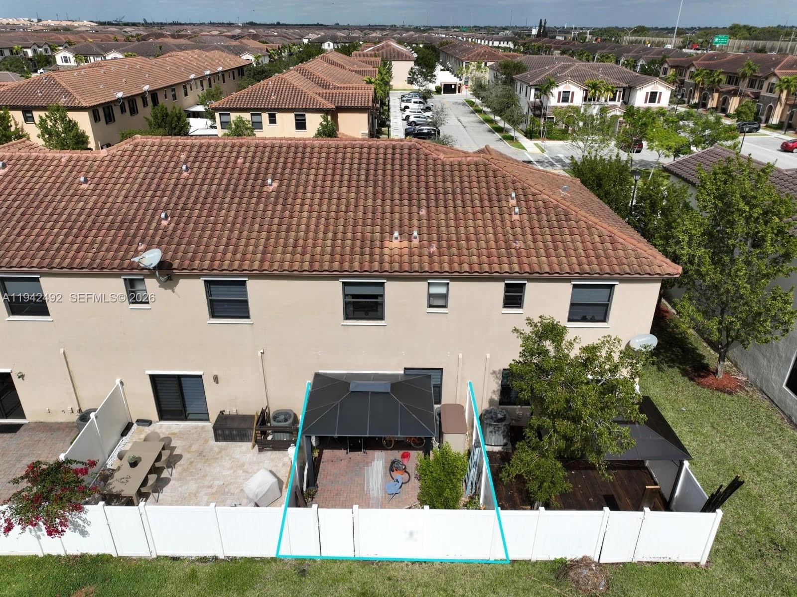 3304 West 92nd Place Hialeah, FL 33018 - Photo 32 of 34 a view of house with yard