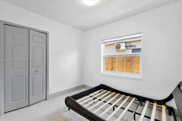a bathroom with a sink a mirror and shower