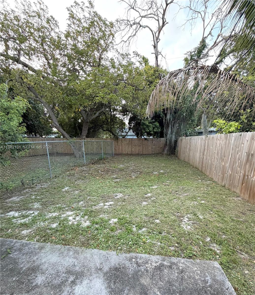 775 Northwest 96th Street, Unit B Miami, FL 33150 - Photo 8 of 9 a view of a backyard