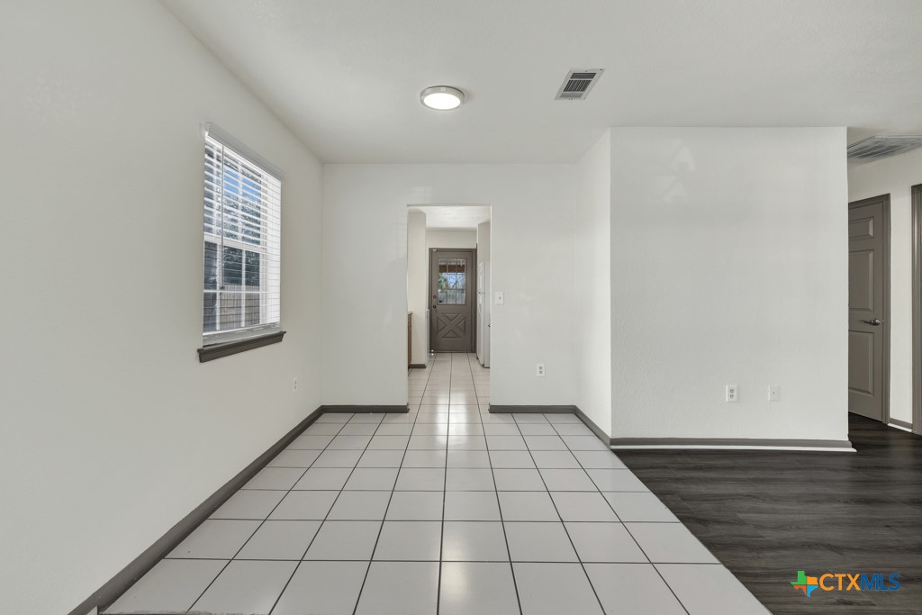 313 Armstrong Street San Marcos, TX 78666 - Photo 7 of 25 a view of an empty room and window