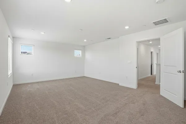 an empty room with an entryway