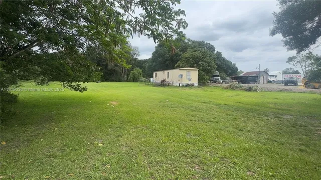 a fire hydrant in the middle of a field
